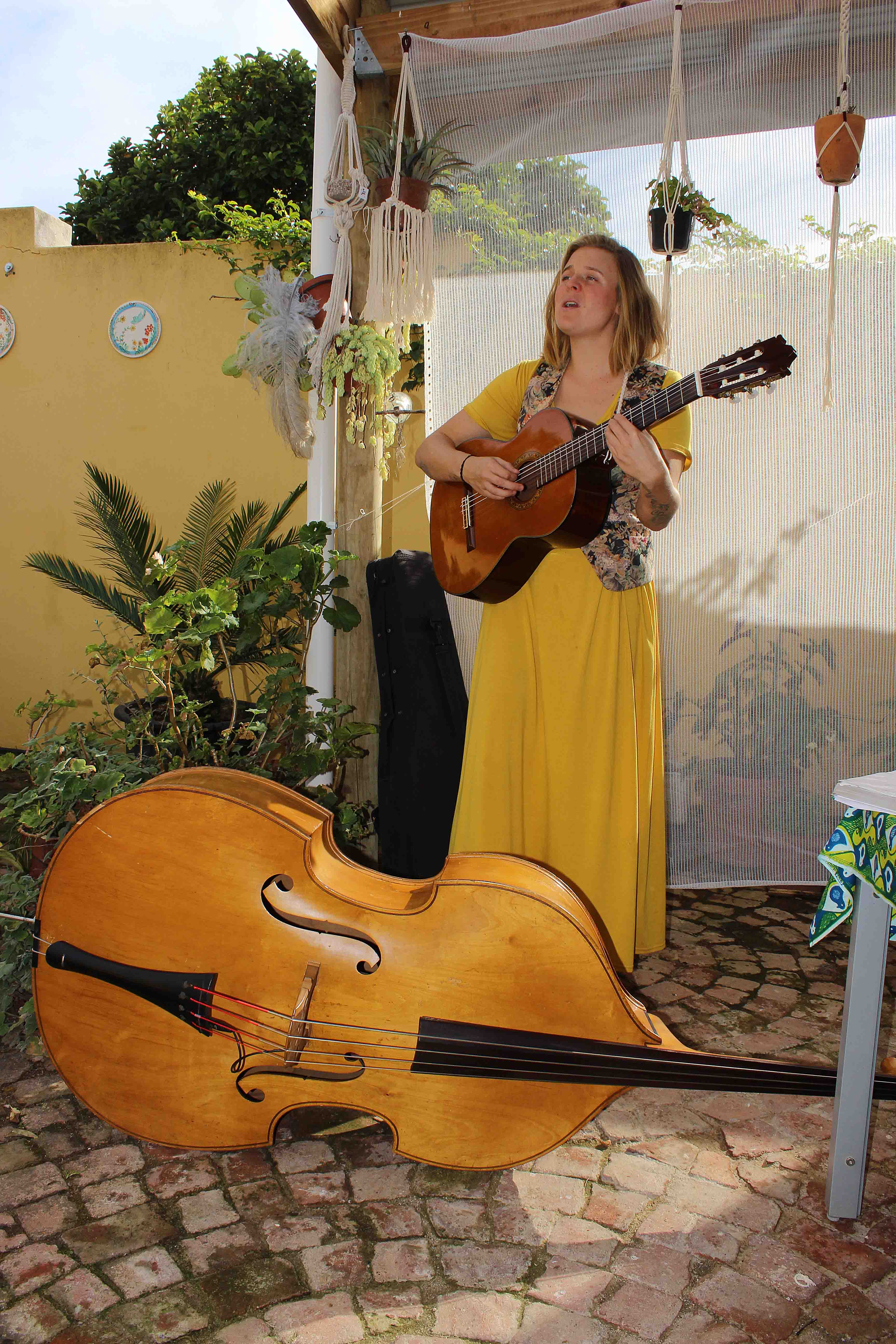 Sarah Blake playing the guitar.